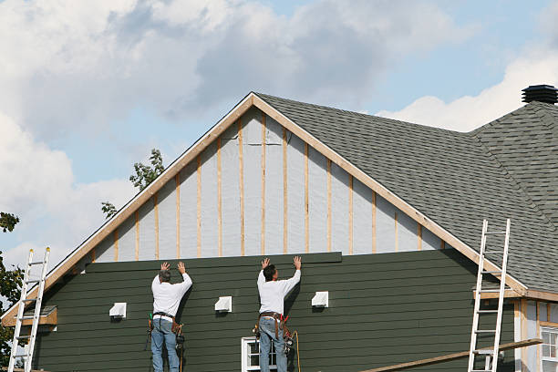 Professional Siding Installation technician working in Maywood, IL